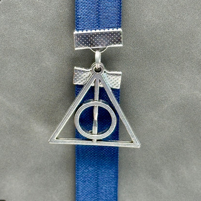 Marcapáginas elástico de las Reliquias de la Muerte de Harry Potter
